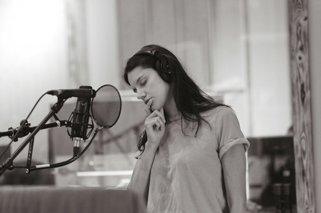 woman practicing voice exercises